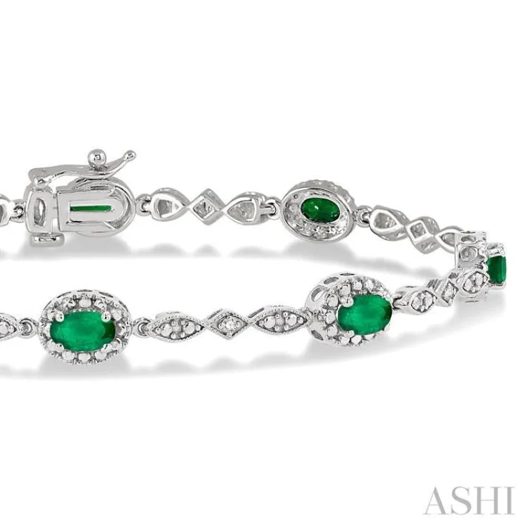 5x3 MM Oval Cut Emerald and 1/20 Ctw Single Cut Diamond Bracelet in 14K White Gold