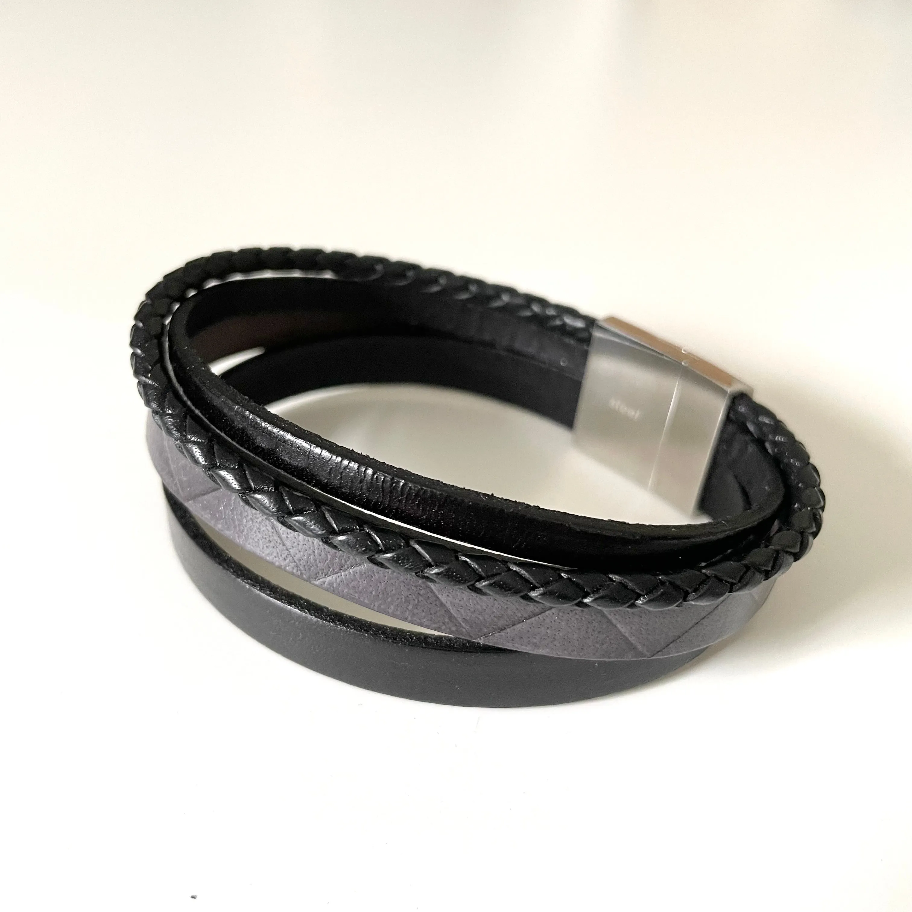 Black and Grey Nappa Leather Braided and Zig-Zag Patterned 4 Band Smooth Men’s Bracelet with a Stainless Steel Magnetic Shiny Finish Clasp